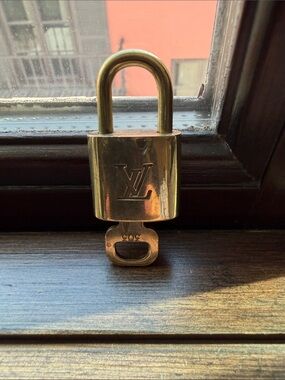 “Authentic Louis Vuitton Lock And Key Set